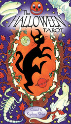 Cover of 'The Halloween Tarot' with a black cat, pumpkins, and other Halloween elements.