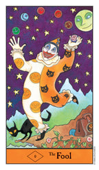 Card featuring a clown with jack-o'-lanterns and a black cat, labeled 'The Fool', against a starry night sky.