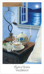 Tea set on a table with a scenic window view, featuring 'Eight of Water' from Valerian tarot cards.