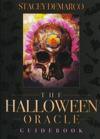 Book cover of 'The Halloween Oracle Guidebook' by Stacey DeMarco with a skull and floral design.