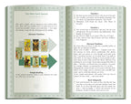 Open book with tarot card spread instructions and illustrations