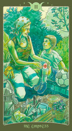 Tarot card featuring 'The Empress' with a woman and child in a garden setting.