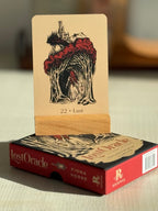 Book with illustration of a woman in a red hat and castle, titled 'Lost Oracle' by Fiona Horne.