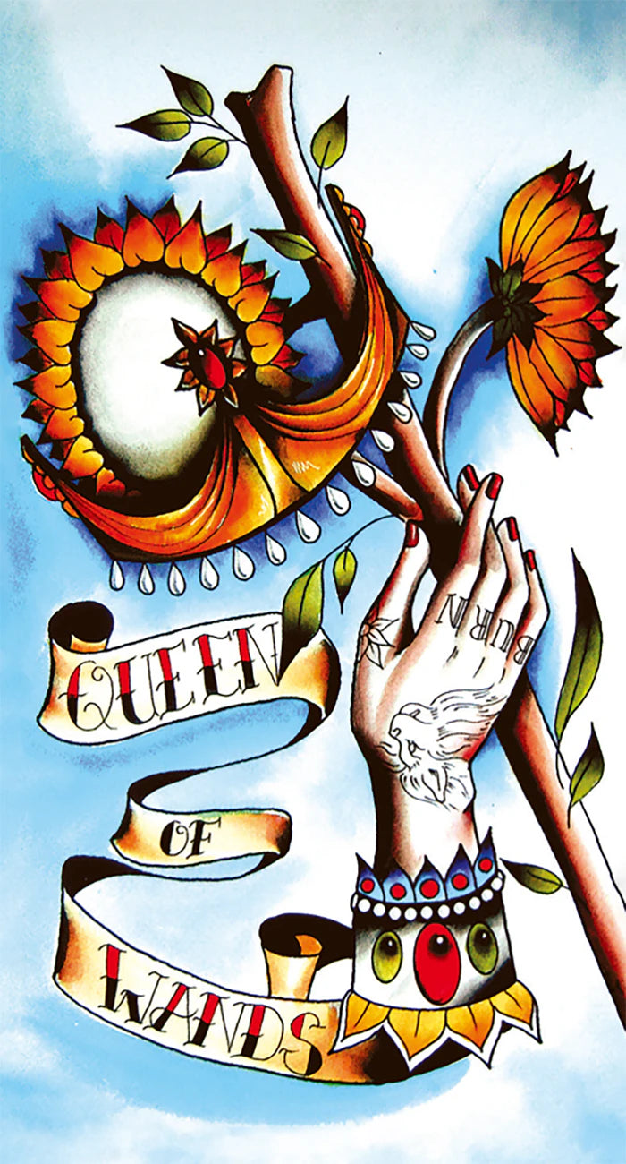 Illustration of a hand with tattoos, flowers, and a banner with 'Queen of Wands' text on a blue background.