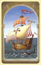 Card with a ship and whale illustration, likely from a tarot deck