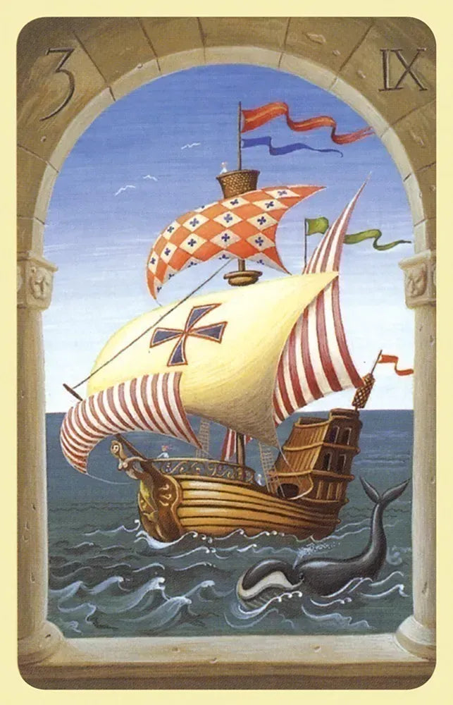 Card with a ship and whale illustration, likely from a tarot deck
