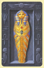 Card with an Egyptian-themed design featuring a mummy and hieroglyphics on a dark background.