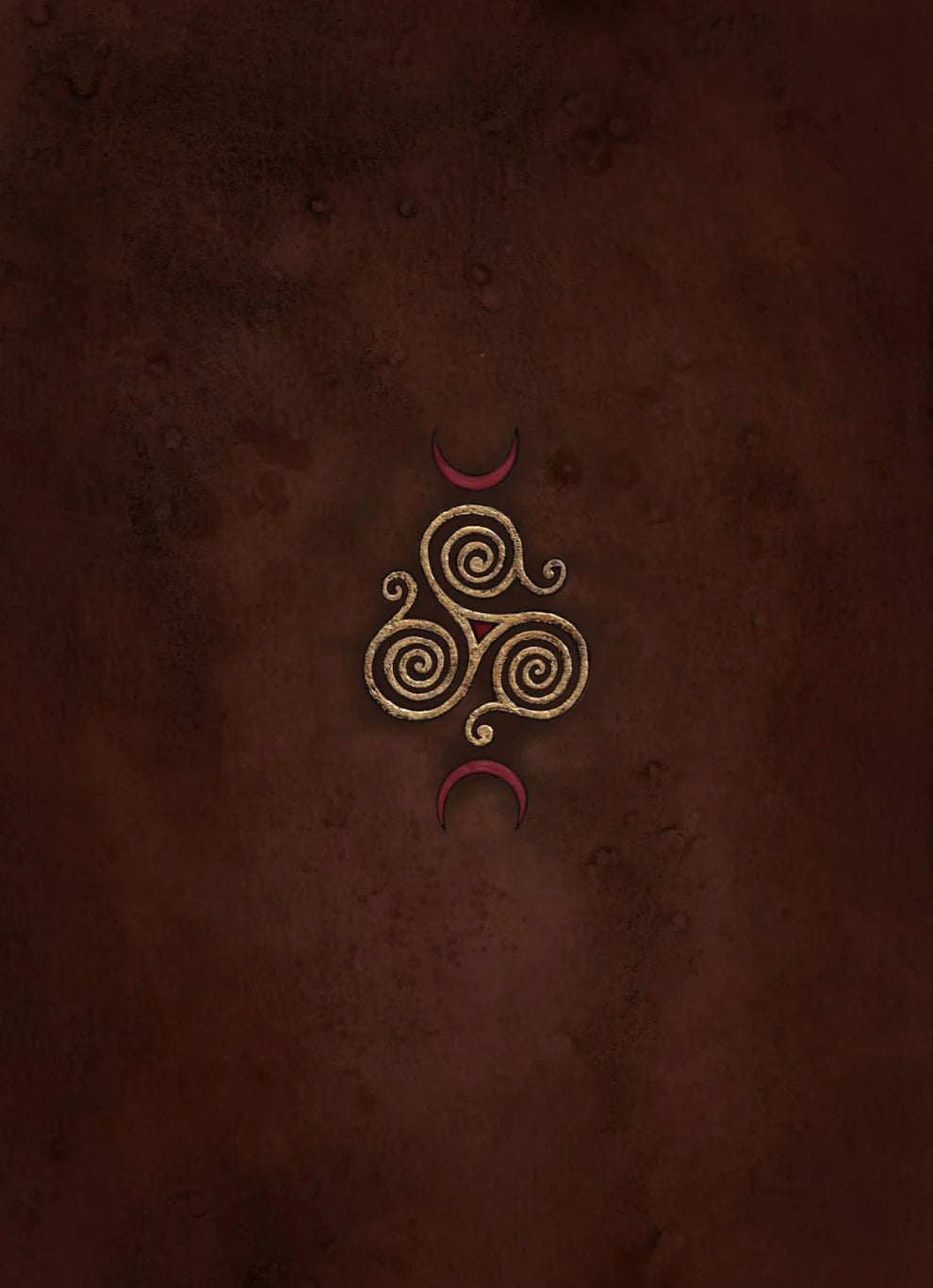 A textured dark brown leather-like surface featuring a central gold Celtic triskelion symbol flanked by two small red crescent moons.
