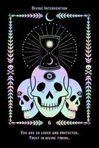 A tarot-style card design on a black background with the title 'Divine Intervention' at the top and the number 6 near the bottom. The central artwork shows three pastel iridescent skulls with a glowing hourglass and moon motif above them, surrounded by decorative leaf borders and a crescent moon.