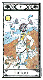 Tarot card featuring 'The Fool' with a person and wolf in a desert landscape.