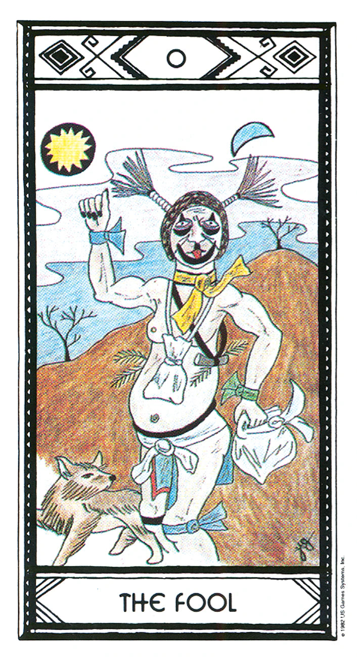 Tarot card featuring 'The Fool' with a person and wolf in a desert landscape.