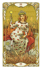 Art Nouveau-style tarot card with a seated figure holding a lantern, intricate border, and number 'III' at the top.