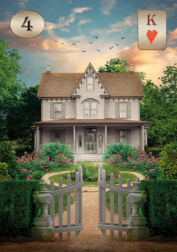 Stylized house with card symbols '4' and 'K' on a scenic background