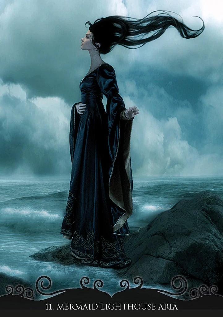 Mermaid in a dark dress standing on a rock with stormy clouds and ocean in the background