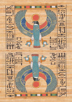 Decorative panel with bird design and hieroglyphics on a wooden background