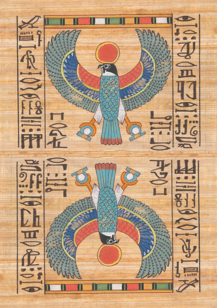 Decorative panel with bird design and hieroglyphics on a wooden background