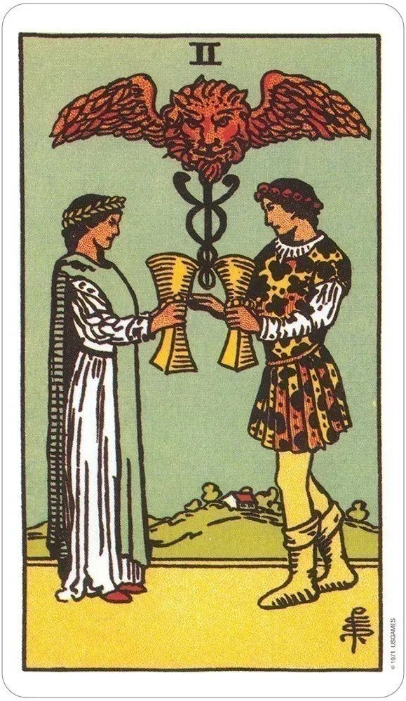 Tarot card with two figures holding a double-headed eagle symbol