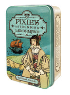 Tin box for Pixie's Astounding Lenormand card set with illustration of a woman and ship on a white background