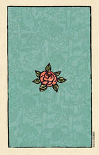 Decorative card with a rose design on a teal background