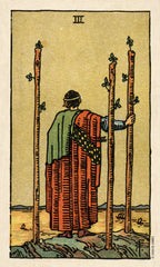 Vintage-style tarot card with a figure between two tall sticks on a beige background