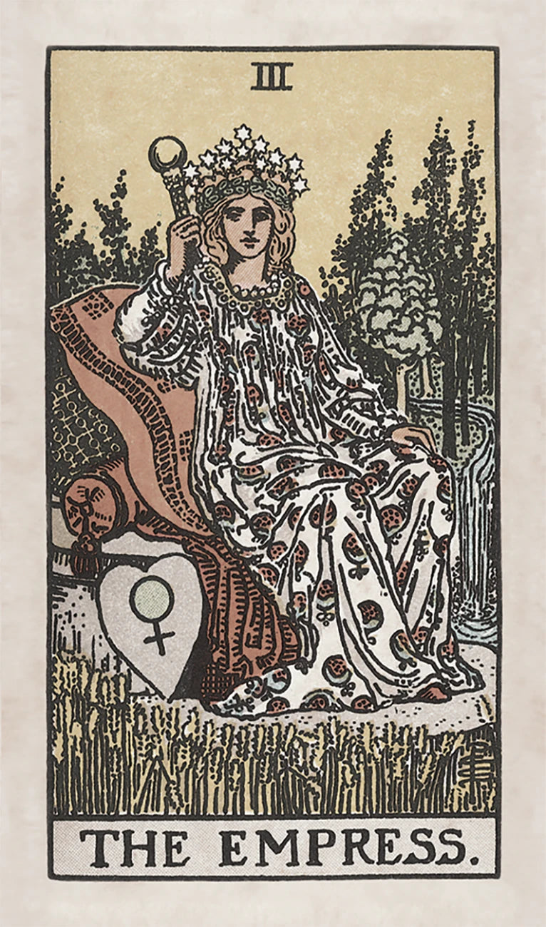 Tarot card featuring 'The Empress' with a woman in a flowing garment and crown, holding a scepter, in a forest setting.