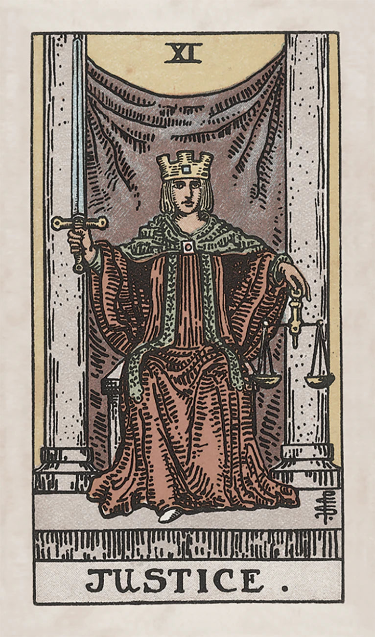 Tarot card featuring a figure labeled 'Justice' with a sword and scales.