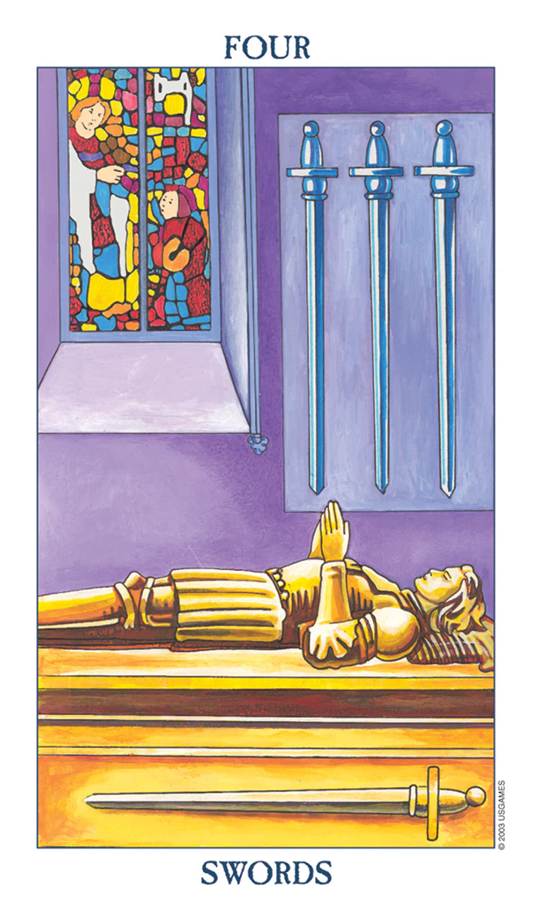Tarot card with a figure lying down, two swords, and a stained glass window.