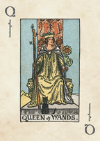 Queen of Wands tarot card with a woman in a yellow dress holding a flower, surrounded by symbols on a beige background.