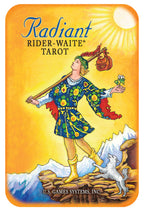 Card from the Radiant Rider-Waite Tarot with a person in colorful attire standing on a mountain peak.