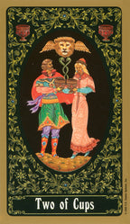 Two of Cups tarot card with decorative border and figures holding cups.