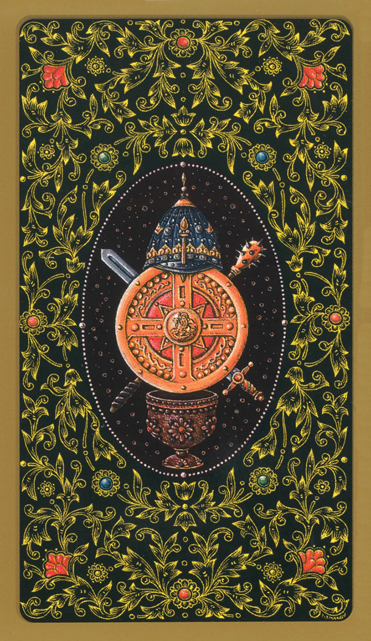 Decorative card with intricate designs and a central emblem on a black background