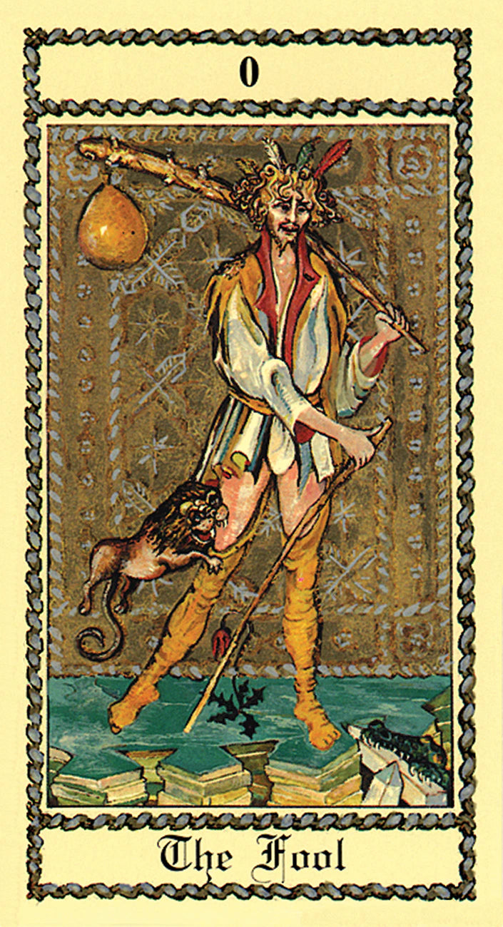 Tarot card featuring 'The Fool' with a person holding a lantern and a dog, on a decorative border.