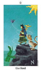Card titled 'The Fool' with a person, tiger, and dragon on a rock against a blue sky.