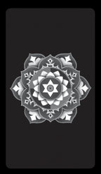Black and white mandala design on a black background