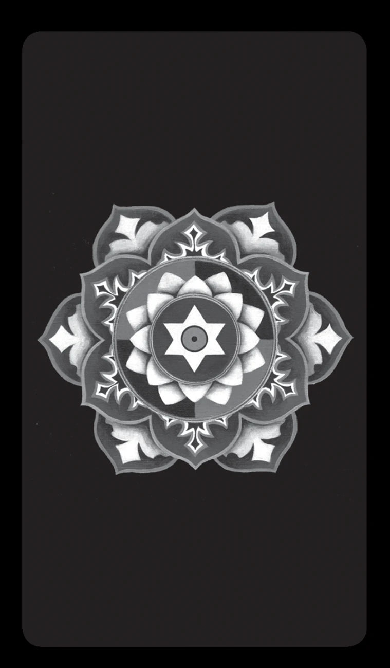 Black and white mandala design on a black background