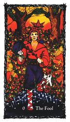 Tarot card featuring 'The Fool' with a person in a red robe and black hat in a forest setting.