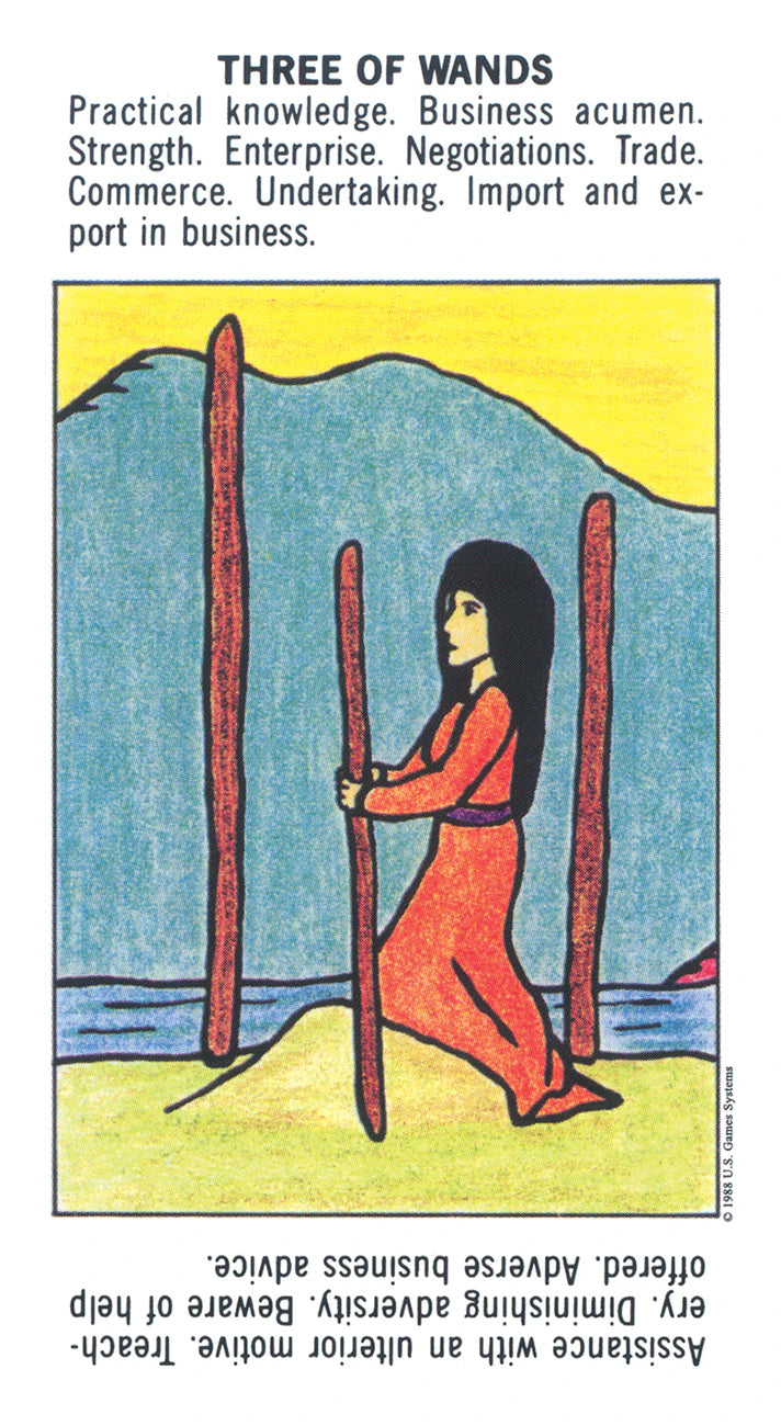 Tarot card with a woman standing between three upright wands against a mountain and sky background.