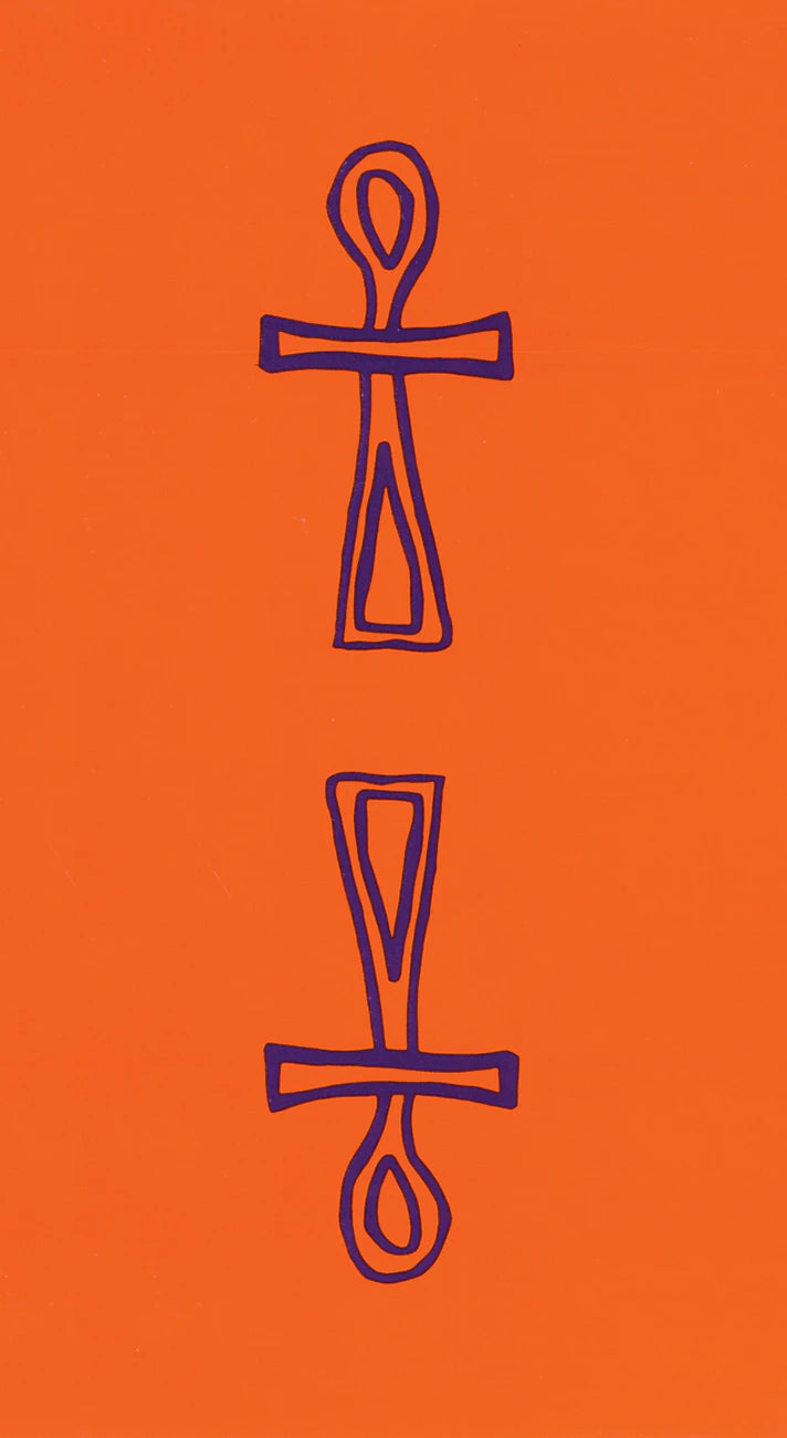 Two ankh symbols on an orange background