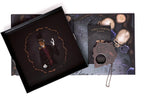 Gothic-themed product packaging with a character design and decorative elements.