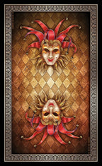Decorative wall art with two ornate masks on a textured brown background.