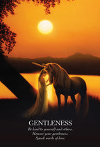 Woman and unicorn standing by a lake at sunset with a motivational quote.