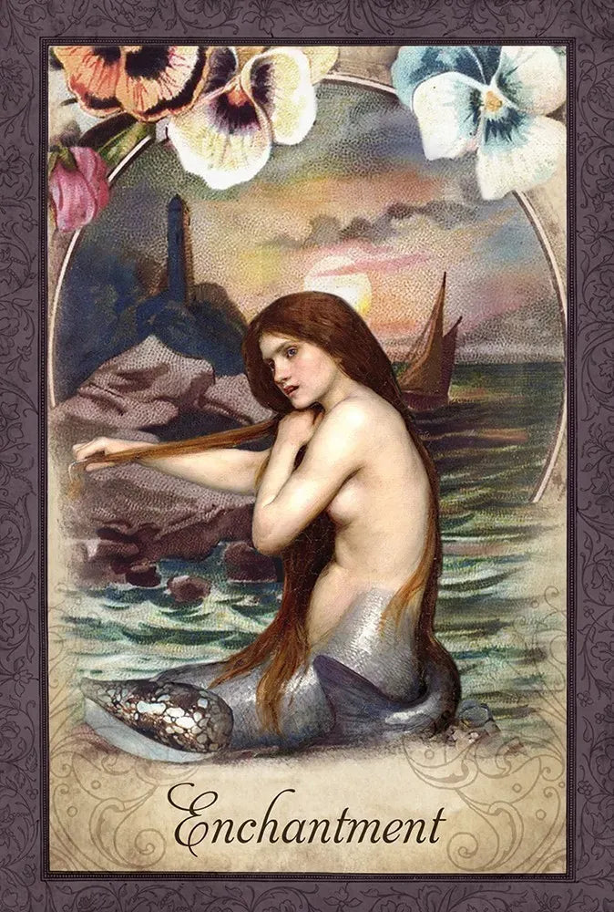 Mermaid sitting on a rock with flowers and a sunset in the background, titled 'Enchantment'.