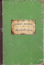 Green garden journal with a decorative label on a green background