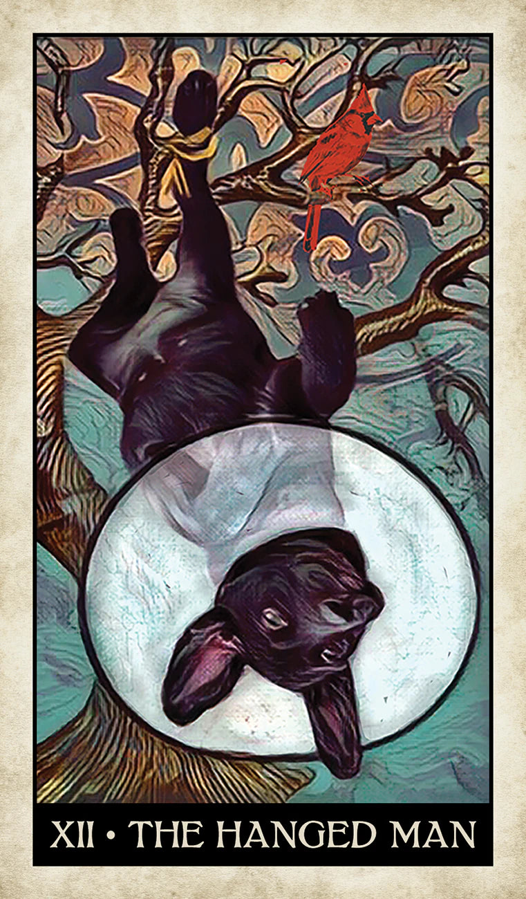 Tarot card featuring 'The Hanged Man' with a black dog hanging from a tree branch.