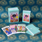Modern Goddess tarot cards on a blue background with eye designs