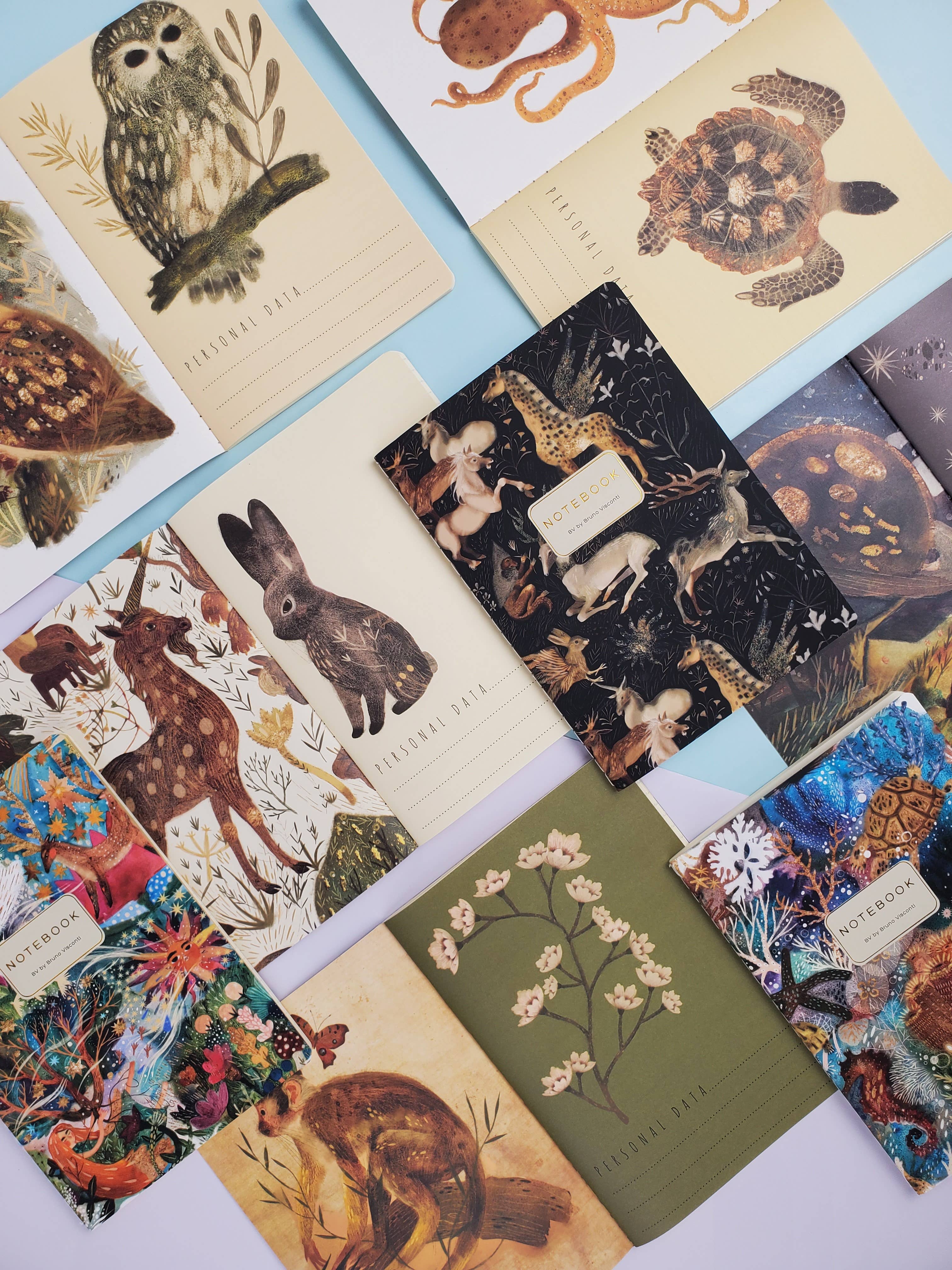 Collection of nature-themed greeting cards with various animals and landscapes.