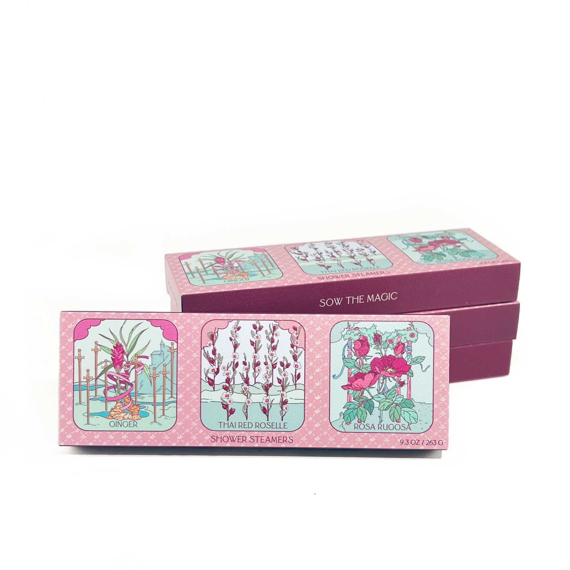 Pink and purple packaging of shower steamers with floral designs on a white background
