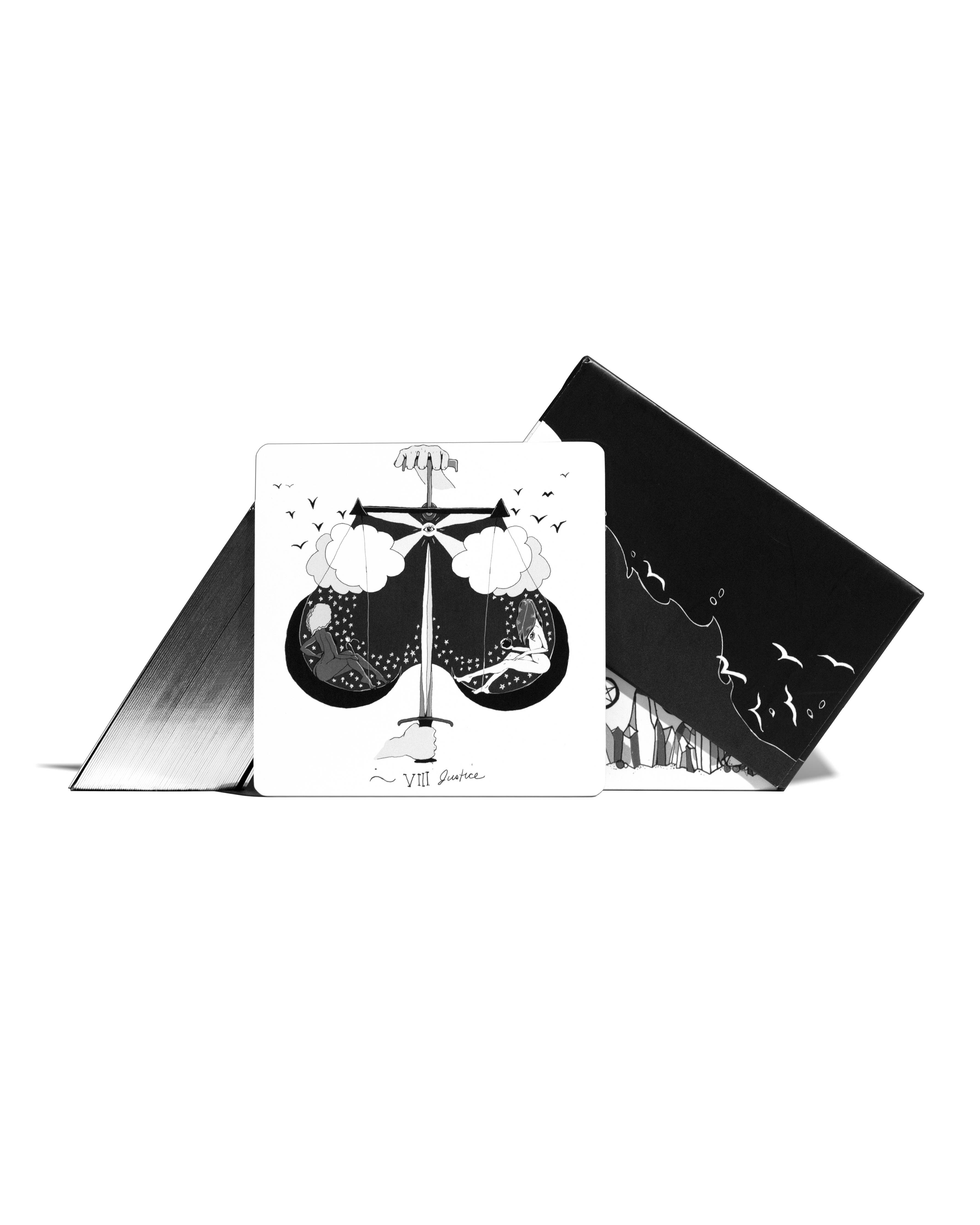 Black and white card with a design of a woman's silhouette and flowers on a white background