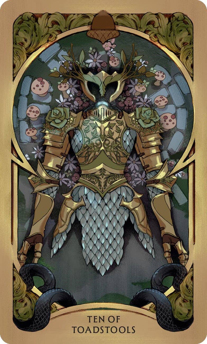 A tarot card titled 'TEN OF TOADSTOOLS' featuring an ornate fantasy illustration of a knight in gold armor with a large beard, surrounded by flowers, skulls, and black toadstool roots at the bottom, on a gold-toned card background.