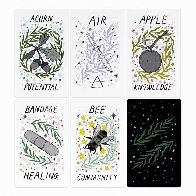 Set of six tarot cards with symbols and text on a white background